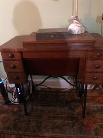 Vintage antique cast iron base treadle with oak desk table and drawers