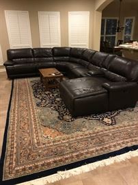 Another Hand Made Rug Room Size with a Huge Leather Sectional with reclining sections. original receipt $5,000 new.