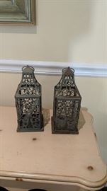 Here are two metal lanterns. Just think how pretty these would look with fairy lights in them! Leave them with this patina look or paint them. At the price of only $5.00 each, you can't go wrong.