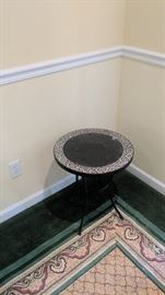 Small round table. Would be nice in a covered porch area. $20.00 
