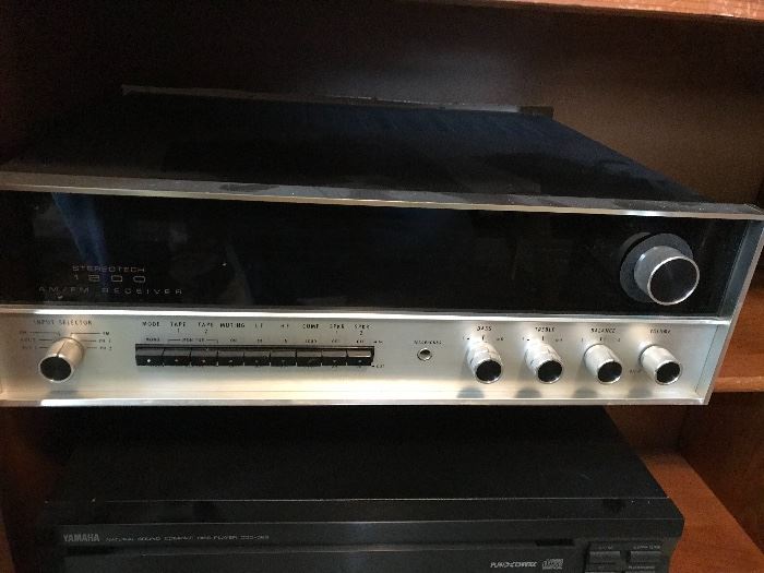 Stereo tech by Macintosh vintage receiver. 