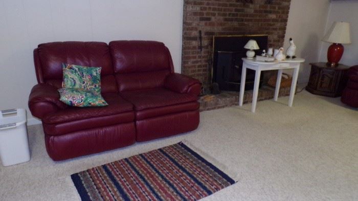 Leather Love Seat, small white Table, misc. in Basement