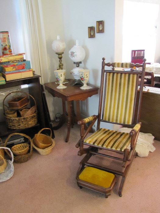 Table lamps on an East Lake Table, baskets, and an antique rocker with stool