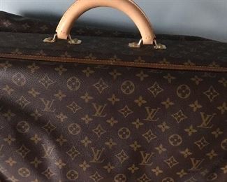 121            Travel  Suit  Bag     (handle replaced by Louis  Vuitton / Reciept)                          $1500.         