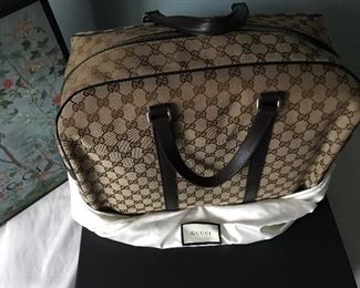 124         Gucci   Large Handbag      Dust Bag  & Box                  
                                                                            $1600.