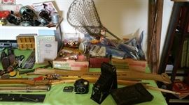 cameras, bows and arrows, nets, fishing accessories