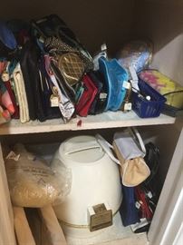 at least 50 cosmetic bags and working vintage dryer