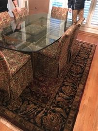Persian Rug ==> ONLY $800                                     Brass/Glass Top Dining Table ==> ONLY $850*                   
* comes with table top protector                                               
Six (6) skirted Marge Carson parsons chairs ==> ONLY $200 each OR all for only $900.  Dimensions:  Length = 7’ 6” X Depth = (widest point) 48” (narrowest points at each end) 38”