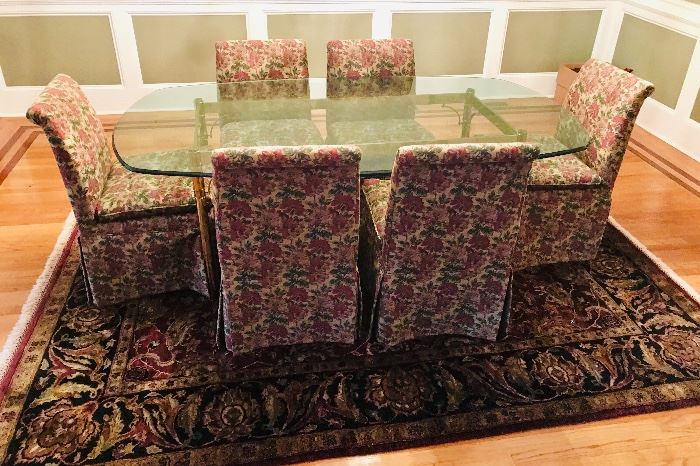 Persian Rug, Brass/Glass Top Dining Table  comes with table top protector, Six (6) skirted Marge Carson parsons chairs  TABLE Dimensions:  Length = 7’ 6” X Depth = (widest point) 48” (narrowest points at each end) 38”