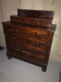 Antique flame mahogany 2 over 4 drawer chest.