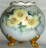 Lot #17: Tri-Footed Rose Bowl Marked E.S. Germany for Erdmann Schlegelmilch, 1881-1938, Painted w/Yellow Roses, Gold Tone Asian Accents & Scrolling Feet, 5.25"T.
