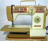 Lot #13: White Majestic Portable Sewing Machine w/Cover, Powers On.