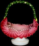 Lot #21: Art Glass Basket w/Starburst Design, Cranberry w/Milk Glass Underside, Folded Rim, Twisted Green Glass Handle, 8.5"D x 8"T.