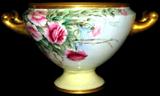 Lot #69: Czechoslovakia Marked Double Handle Pedestal Compote, Decorated w/Dark Pink Roses w/Gold Tone Trim, 7"D x 6"T.