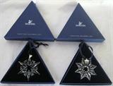 Lot #129:  Two Swarovski Crystal Snowflake Christmas Ornaments (3"), 2003, 2007.
