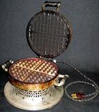 Lot #221:  Vintage Kitchen Appliances Plus Lot, Including Juice-O-Mat in Box, Well Marked Ricer and Decorated Waffle Iron.