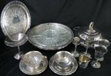 Lot #244: Silverplated Entertaining Lot, Inc. Jefferson Round Gallery Tray w/Liner (13"D), Round Covered Casserole w/Liner, Spanish Goblets (2), Candle Holders (2) and Compote, Mayonnaise Bowls (2) and a Baby Cup.