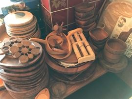 Wooden plates, bowls and other dishware
