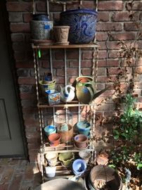 Iron Metal Shelving Unit filled with Planters