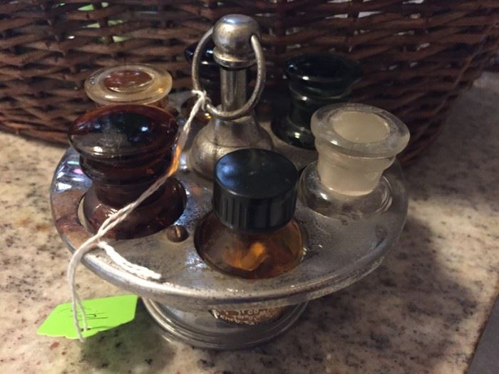 Not sure what to call this.... maybe for ink ? Bottles are about 2 inches in size.
