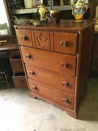 Great vintage "chester" drawers with maple leaf carving and knobs