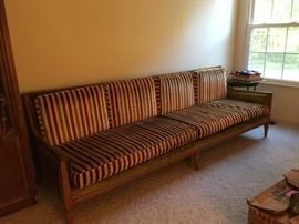 Mud-century modern long sofa upholstered in velvet