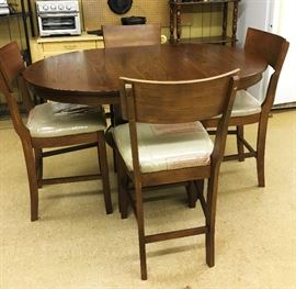 BRAND NEW TABLE AND BAR CHAIRS STILL WITH THE PLASTIC COVERINGS.