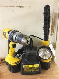 DEWALT 14.4 VOLT COMBO.  COMES WITH DRILL, FLASHLIGHT, CHARGER AND THREE BATTERIES
