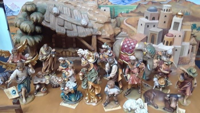 A glimpse of the Conrad Modorer hand carved wood Nativity and backdrop original purchased at Neiman Marcus.