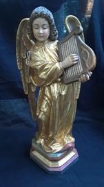 Gorgeous, large hand carved wood angel by artisan Conrad Modorer. Originally $3,800 with price tag on bottom, she is priced at $1,800 and offers will be considered.