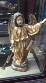 This is the fourth hand carved angel. Smaller than the largest one.