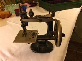 Small Singer Sewing Machine.