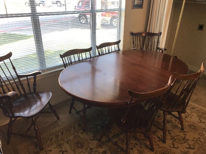 Cherry dining table w/6 chairs and two leafs $375