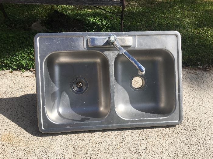 Stainless sink - we're selling it all AND the kitchen sink =)