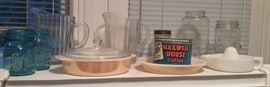 Blue canning jars, glass pitchers, Fire King baking pans, old coffee can, milk glass Sunkist reamer