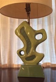 Close up of biomorphic green ceramic lamp by Aladdin 