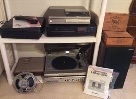 RCA VCR with remote, Yamaha PX-55 turntable, TMK brand VCR, pair of Jensen Concert Series speakers, Panasonic SG-VO3 stereo system with AM/FM radio, turntable, cassette & 2 speakers + wooden cigar boxes 