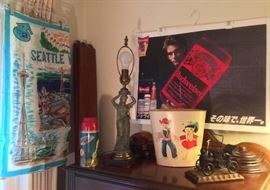 Eclectic goodies: 1962 Seattle Worlds Fair scarf, vintage space theme Thermos, goddess lamp, adorable waste basket, 1992 Huey Lewis/Budweiser Japan tour poster, metal jalopy sculpture