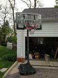Adjustable, portable basketball hoop