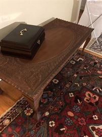 Carved coffee table