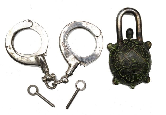 Figural Padlock and a Pair of H & R Arms Handcuffs