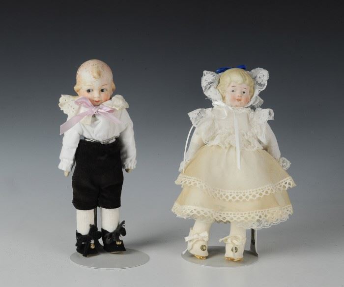 (2) Molded Bisque Boy & Girl Dolls