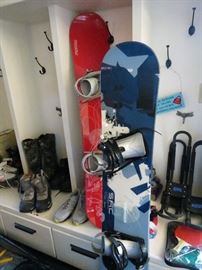 2 SNOW BOARDS WITH BOOTS.