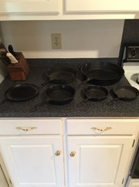 Lots of cast iron skillets