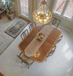 Mahagony Table and Chairs with Duncan Phyfe Brass Feet, and Carved posted on Pedistals