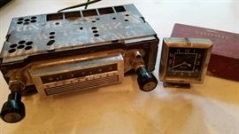 Vintage car accessories including Studebaker radio