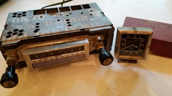 Vintage car accessories including Studebaker radio