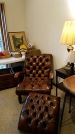 Brown leather chair and ottoman