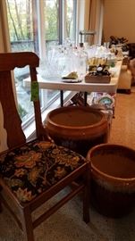 Variety of old chairs, pottery