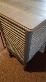Side and back of upcycled kitchen island with reclaimed galvanized metal.
